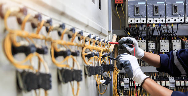 Professional Electrician technician working in Madisonville, LA